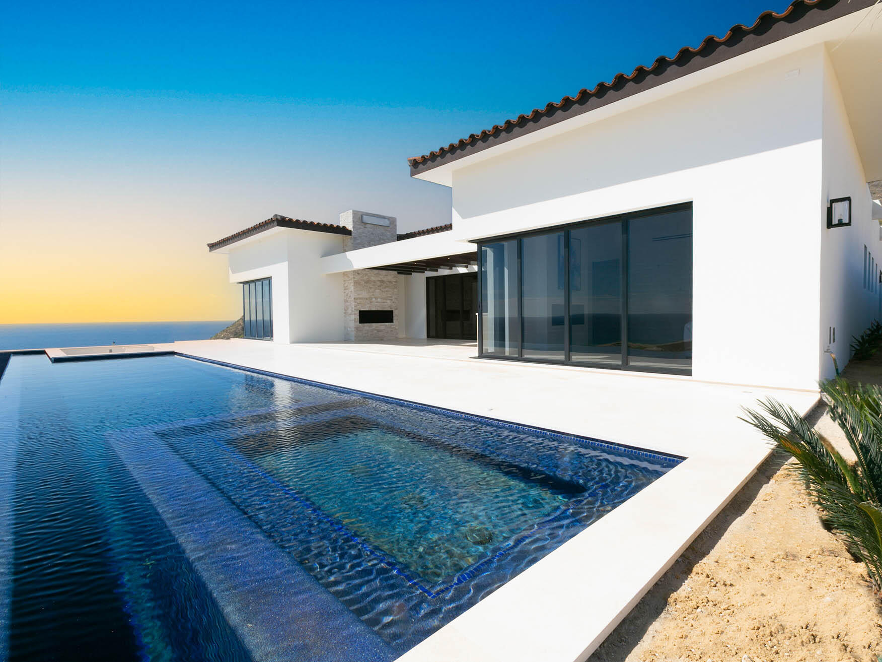 Puerto Los Cabos Copala Lot 40 is a stunning two-story residence featuring dual primary suites on the upper level, offering expansive Pacific Ocean for sale